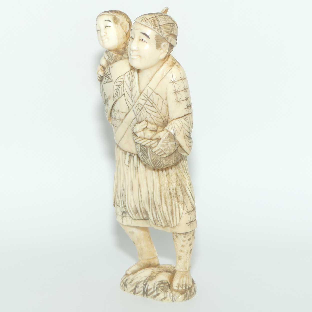Japanese Carved Ivory Okimono figure | Father and Son Fisherman