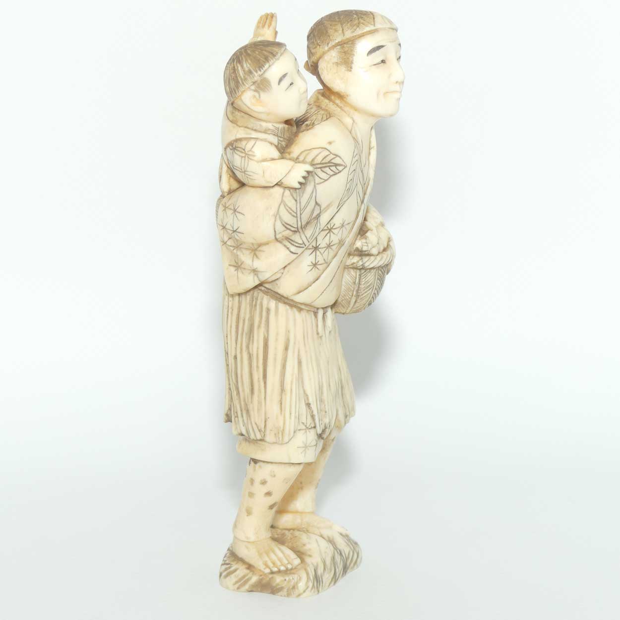 Japanese Carved Ivory Okimono figure | Father and Son Fisherman