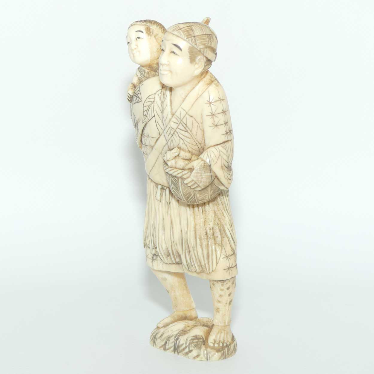 Japanese Carved Ivory Okimono figure | Father and Son Fisherman