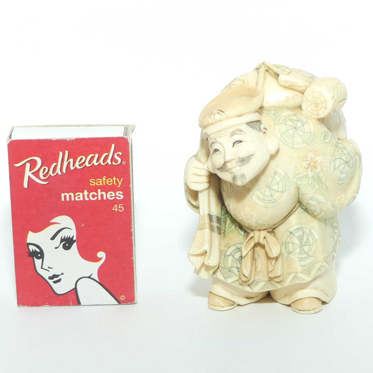 Japanese Carved Ivory Okimono figure | Travelling Man Carrying large Sack