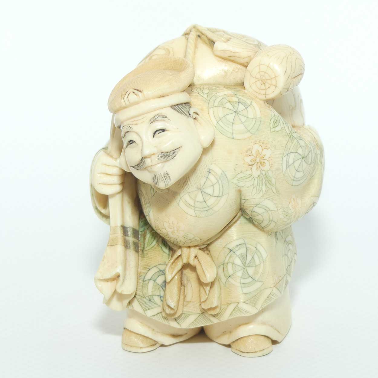 Japanese Carved Ivory Okimono figure | Travelling Man Carrying large Sack