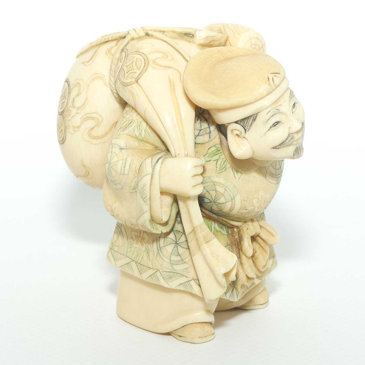 Japanese Carved Ivory Okimono figure | Travelling Man Carrying large Sack