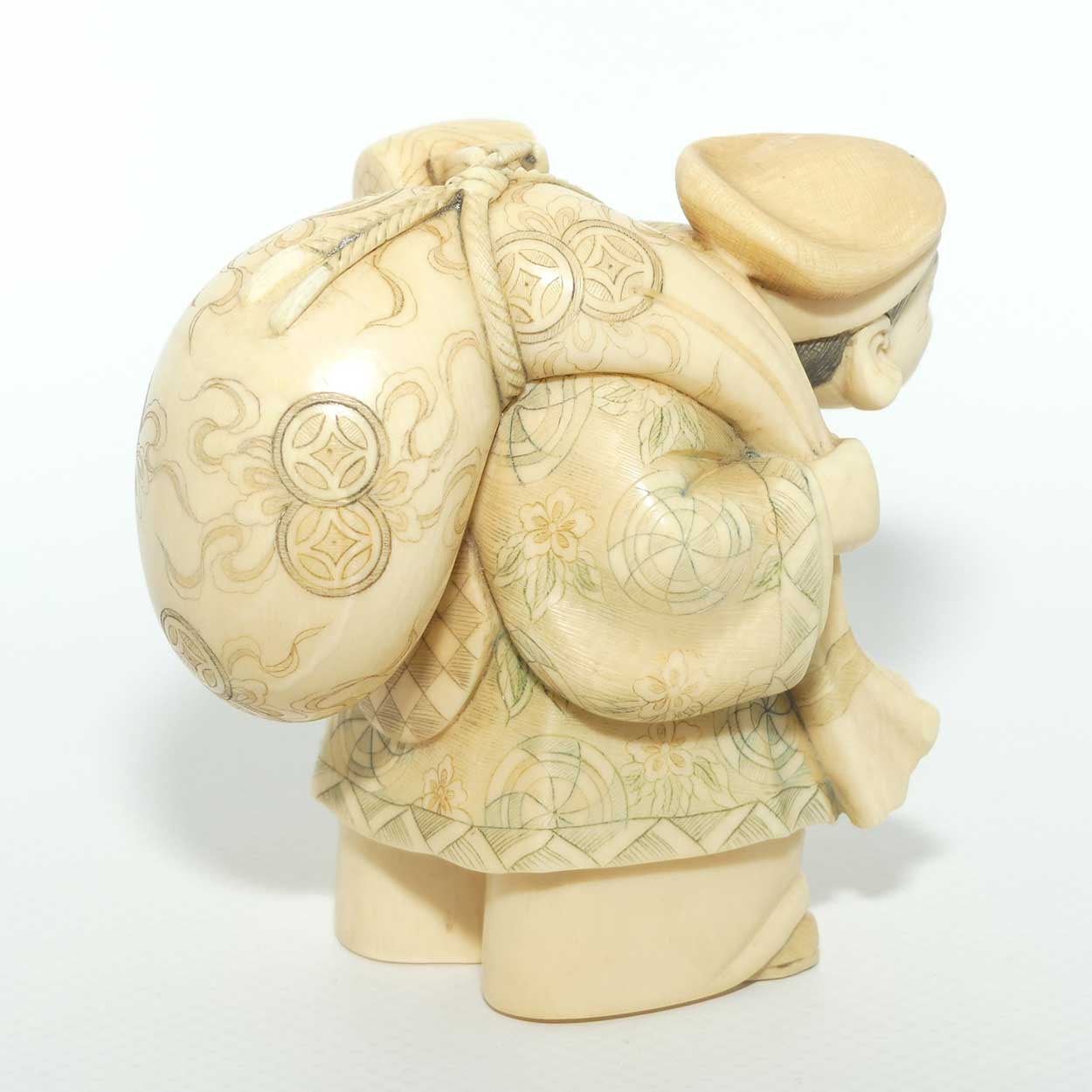 Japanese Carved Ivory Okimono figure | Travelling Man Carrying large Sack