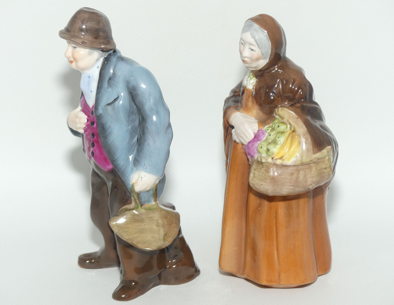 Coalport figurine pair | Tinker and Old Market Lady