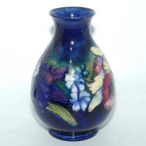 Walter Moorcroft Orchid on Blue Ground vase | Shape 7/9