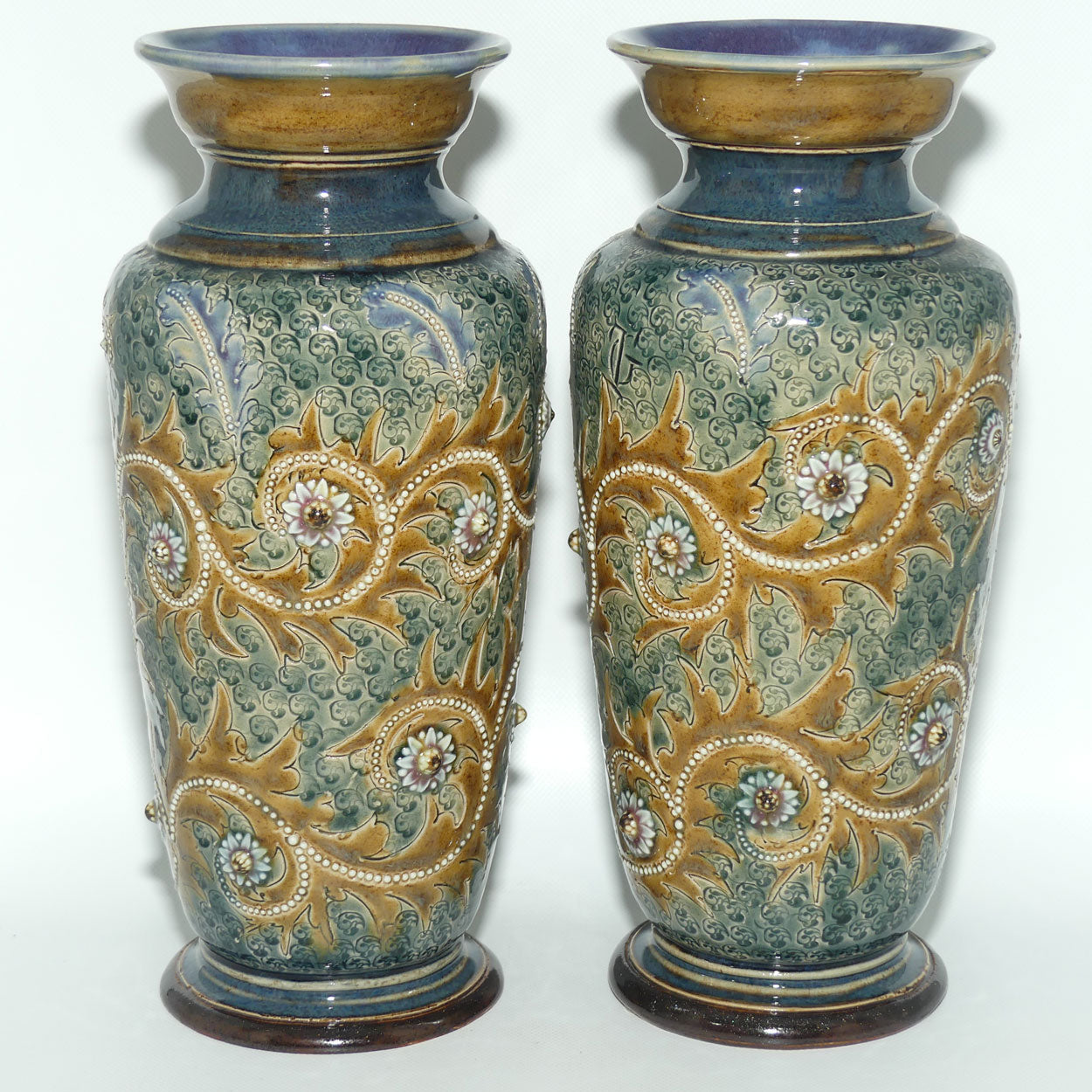 Doulton Lambeth George Tinworth stoneware pair of conical vases with applied baguette beads and foliage