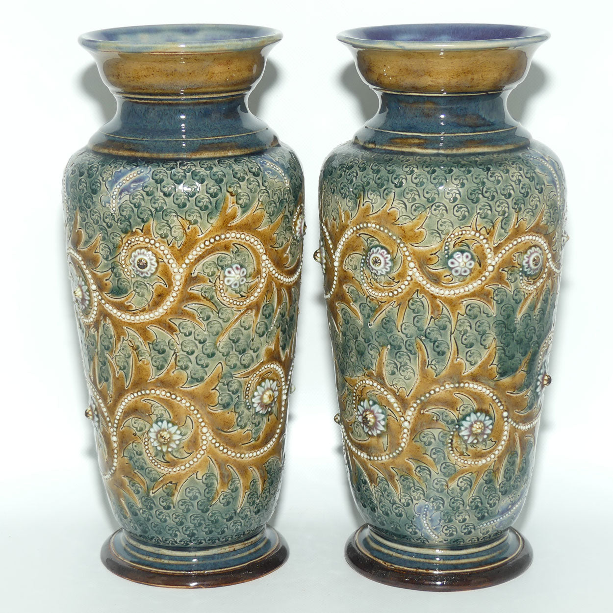 Doulton Lambeth George Tinworth stoneware pair of conical vases with applied baguette beads and foliage