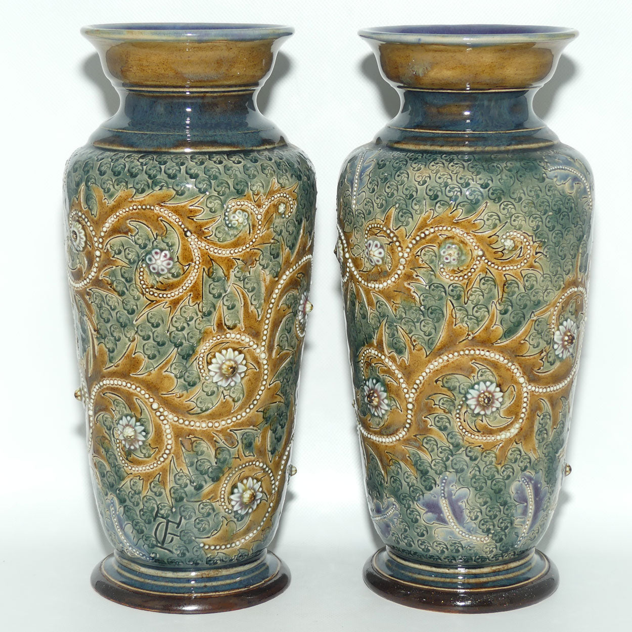 Doulton Lambeth George Tinworth stoneware pair of conical vases with applied baguette beads and foliage