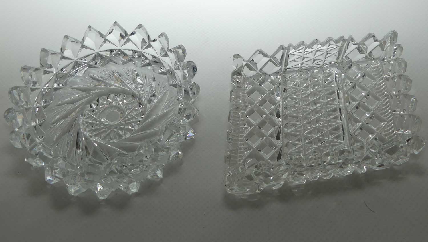 Pair of finely cut crystal butter dishes in presentation box