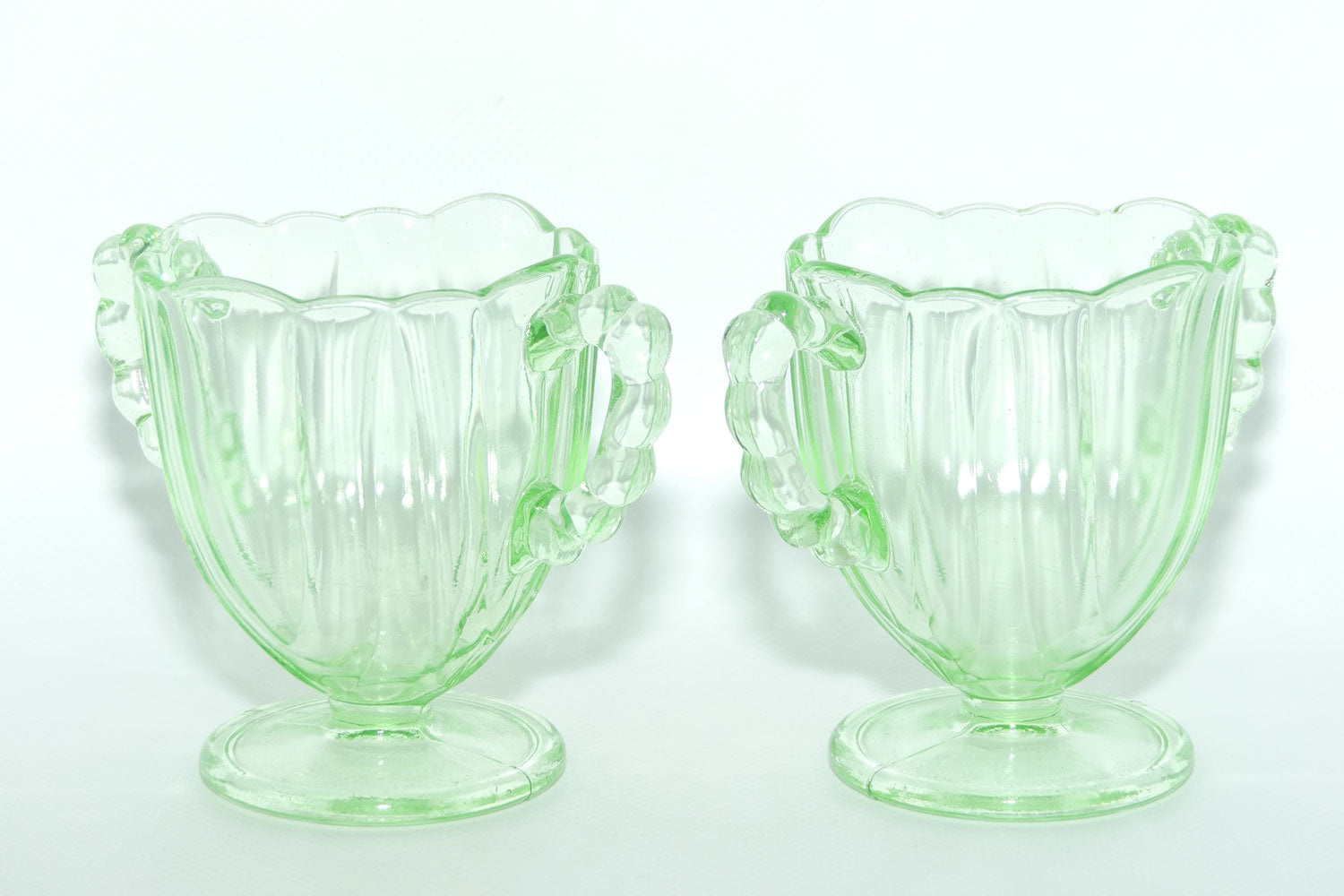 Pair of Ribbed handle Green Glass footed vases | 9.5cm tall