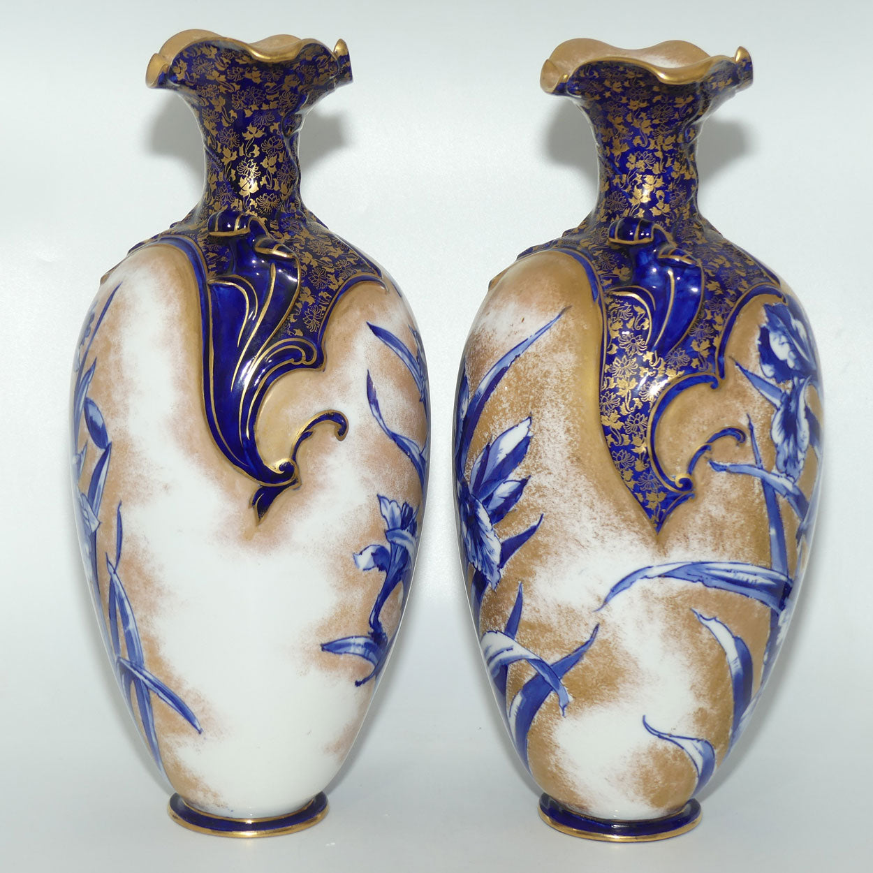 Doulton Burslem Blue Iris and Daffodil pair of large fancy bulbous vases with little handles and gilt highlights