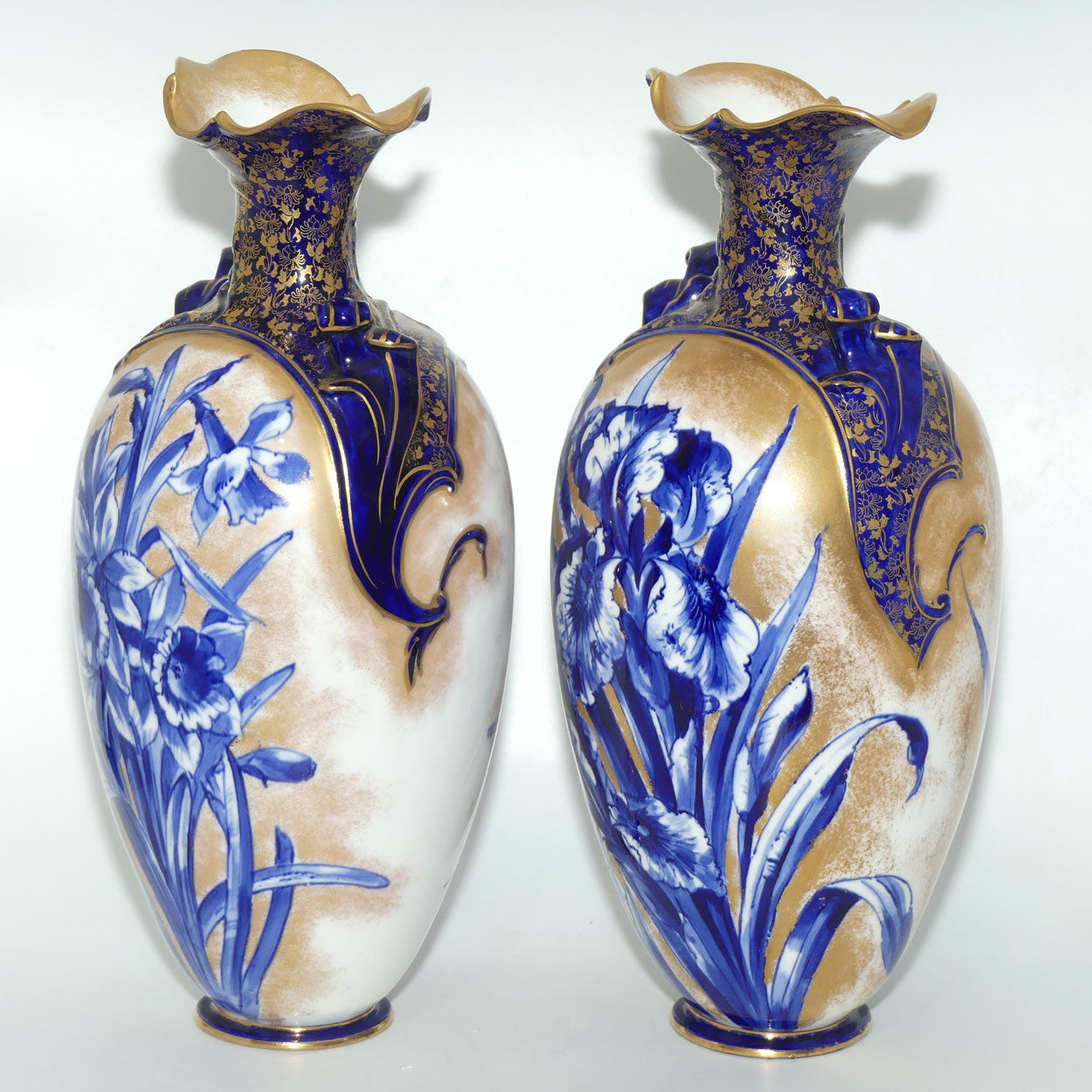 Doulton Burslem Blue Iris and Daffodil pair of large fancy bulbous vases with little handles and gilt highlights