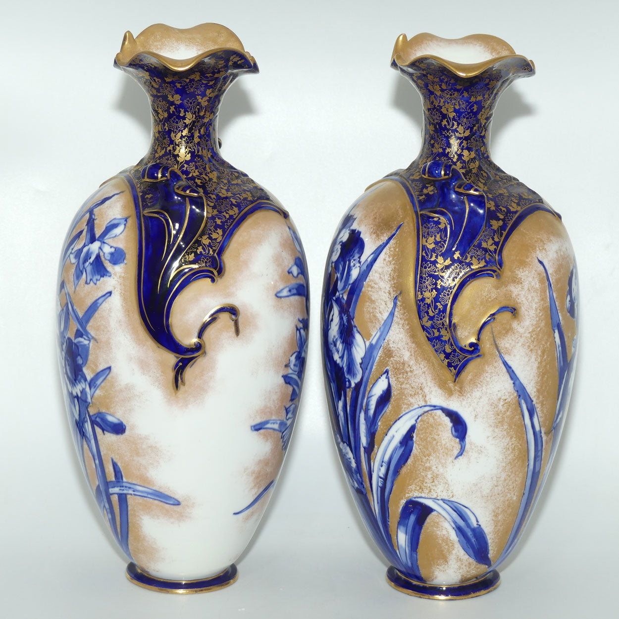Doulton Burslem Blue Iris and Daffodil pair of large fancy bulbous vases with little handles and gilt highlights