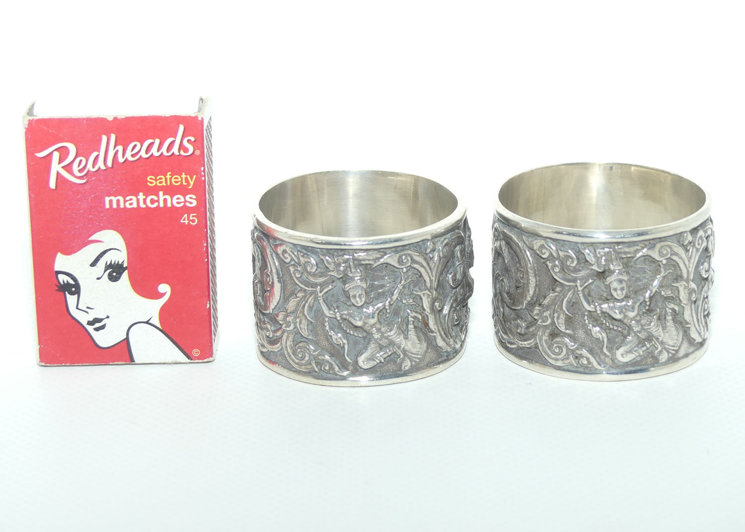 Pair of Heavily Embossed Siam Sterling Silver napkin or serviette rings | 52.15g the pair