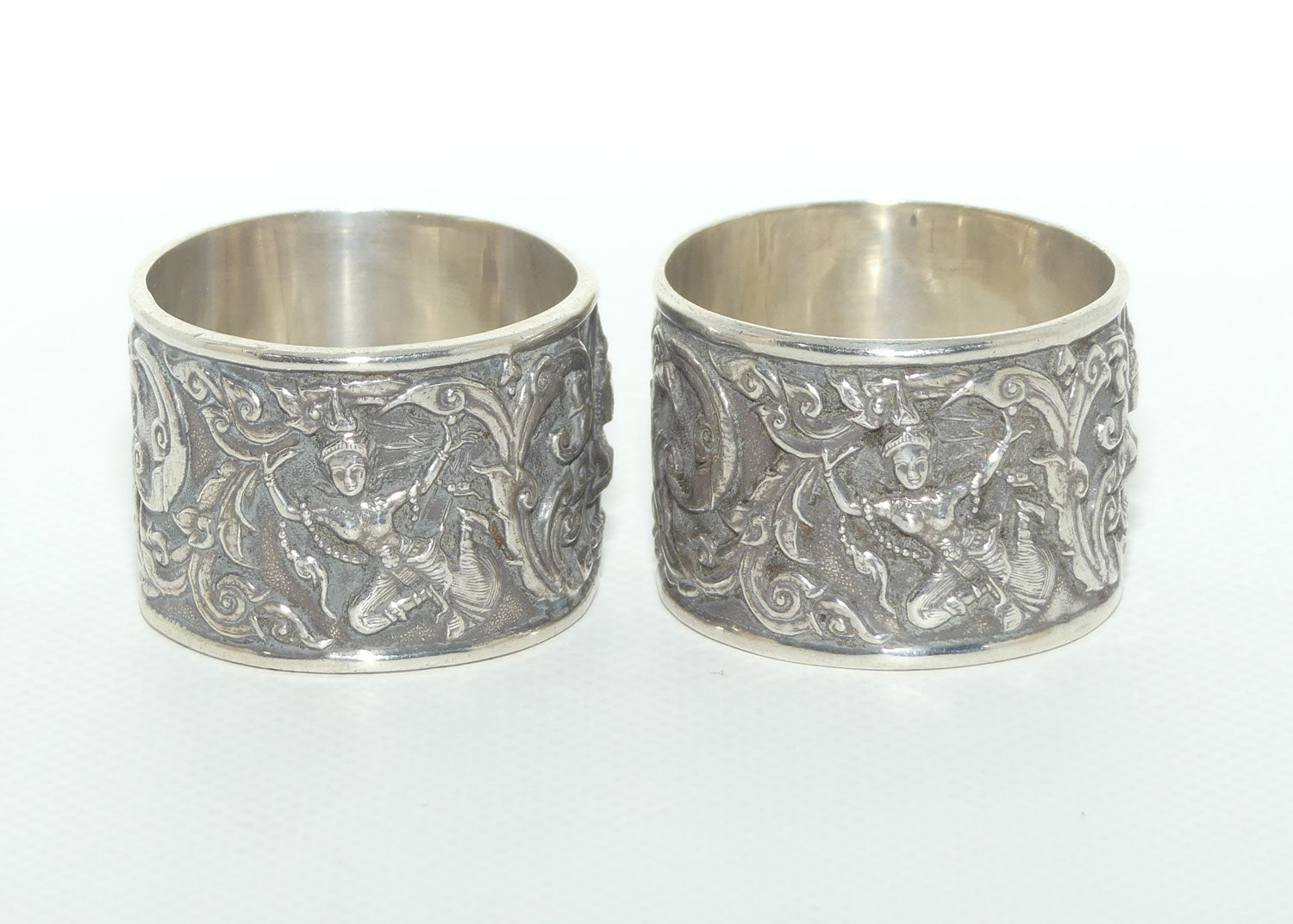 Pair of Heavily Embossed Siam Sterling Silver napkin or serviette rings | 52.15g the pair