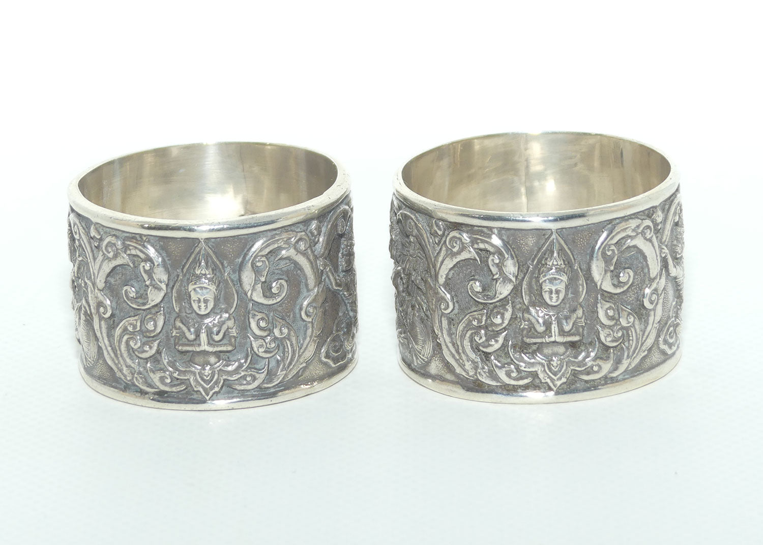 Pair of Heavily Embossed Siam Sterling Silver napkin or serviette rings | 52.15g the pair