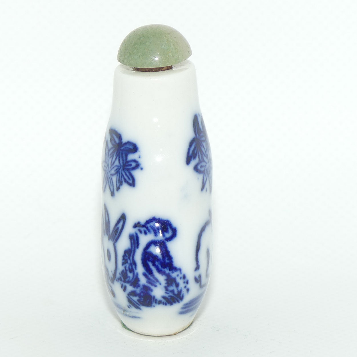 Chinese snuff bottle with greenstone stopper | Pair of Rabbits