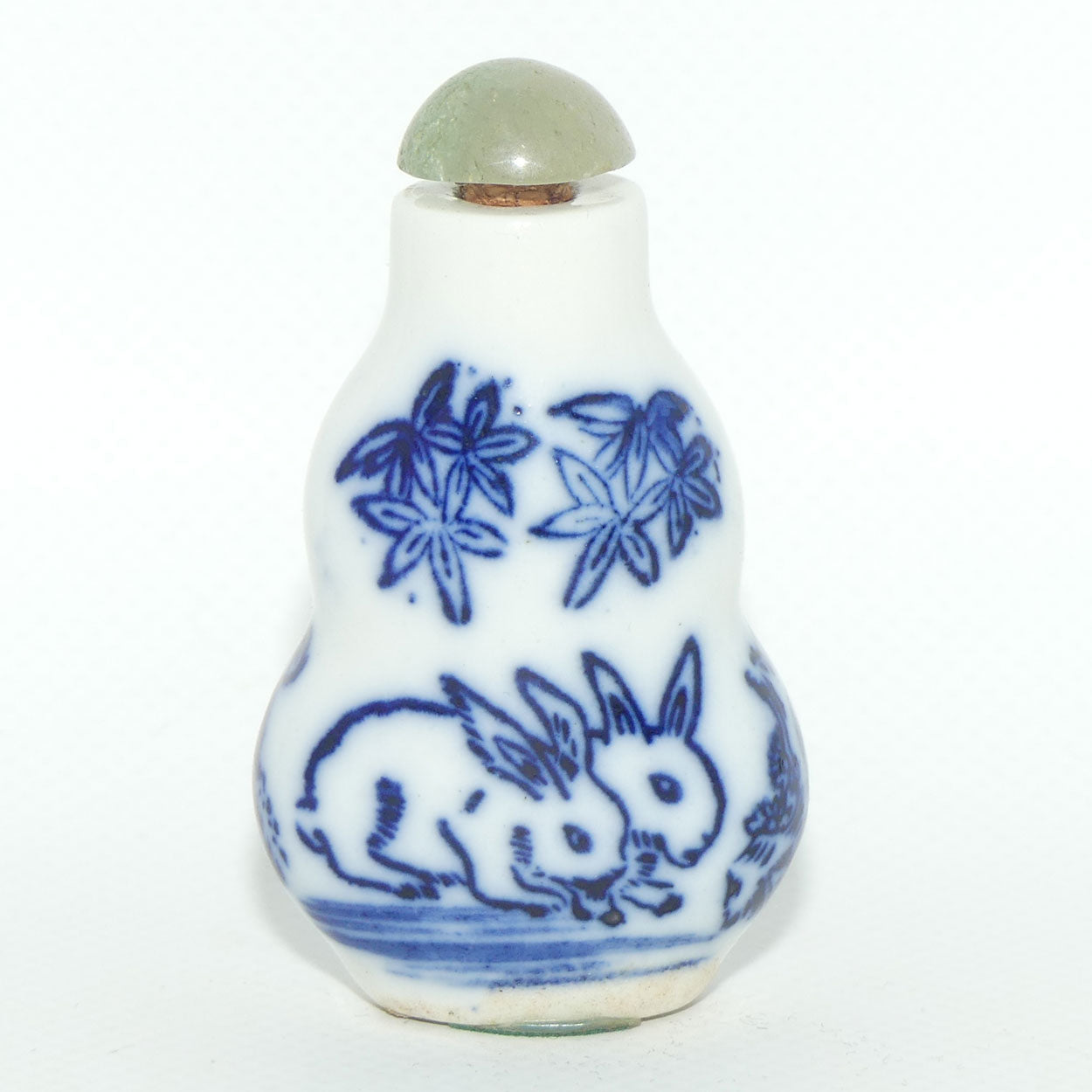 Chinese snuff bottle with greenstone stopper | Pair of Rabbits