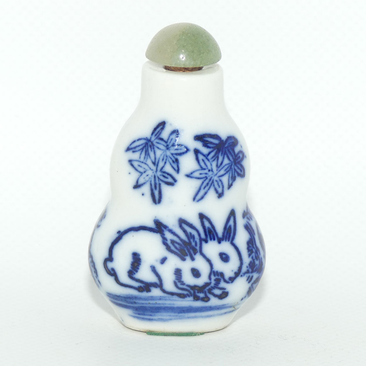 Chinese snuff bottle with greenstone stopper | Pair of Rabbits