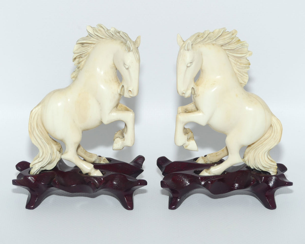 Carved Ivory pair of figures on matched bases | Rearing Horses