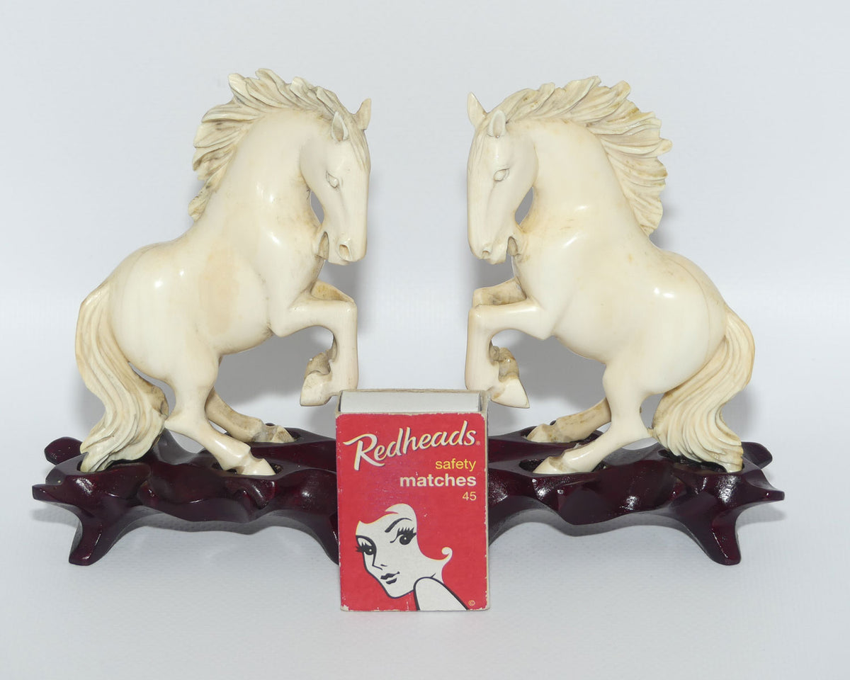 Carved Ivory pair of figures on matched bases | Rearing Horses