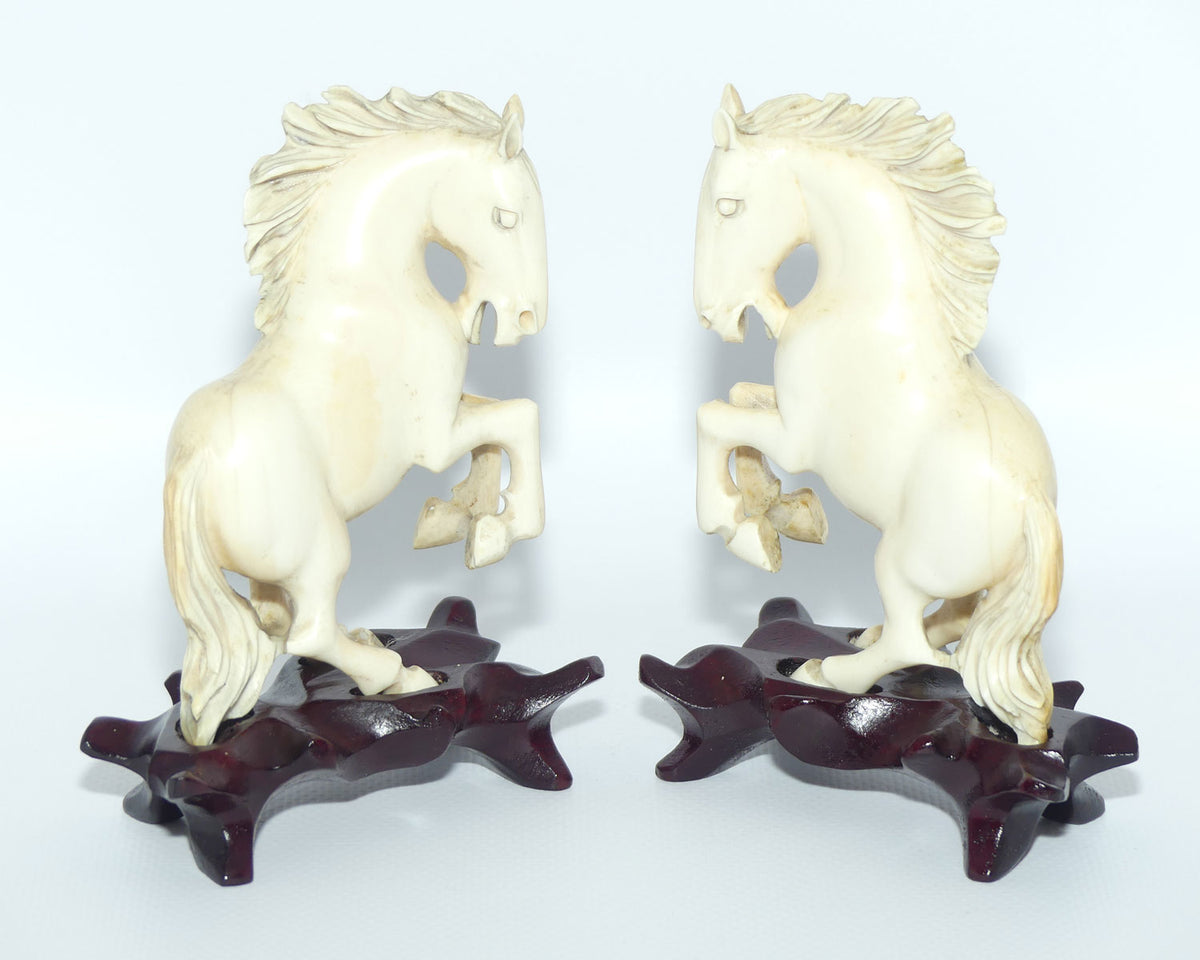 Carved Ivory pair of figures on matched bases | Rearing Horses