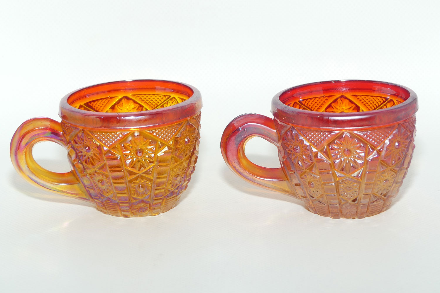 Pair of Indiana Carnival Glass cups | Red Amberina | Heirloom pattern