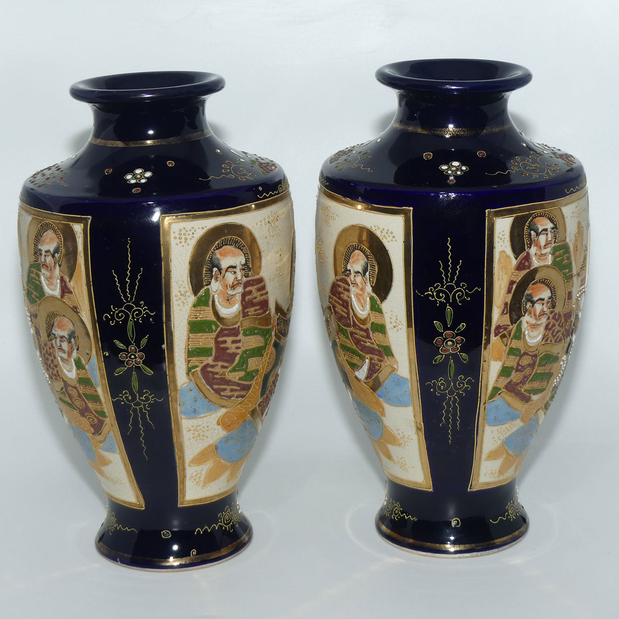Early 20th century Satsuma pair of large bulbous vases | decorated with matching mirror image with enamelling and gilt highlights