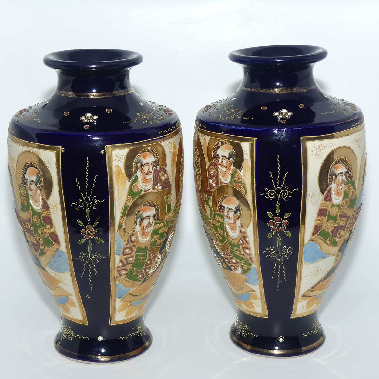 Early 20th century Satsuma pair of large bulbous vases | decorated with matching mirror image with enamelling and gilt highlights