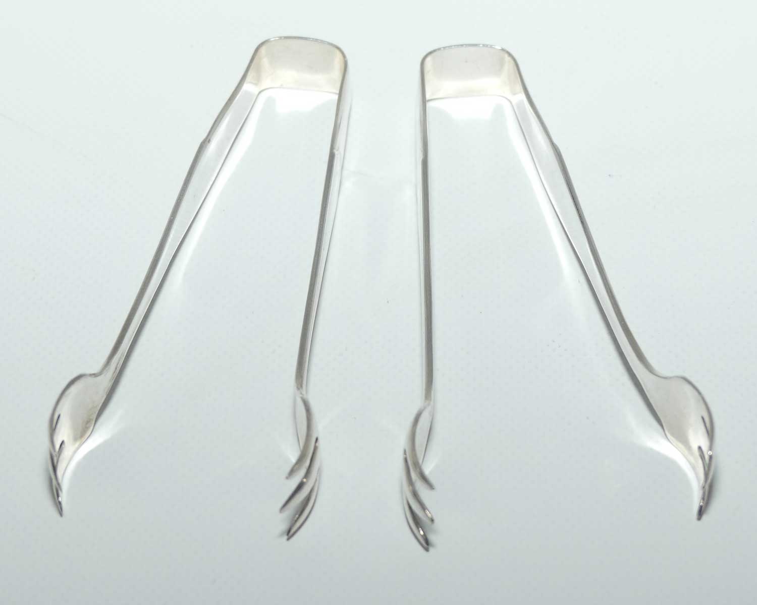 Two sets of small Silver Plated EPNS claw type sugar tongs