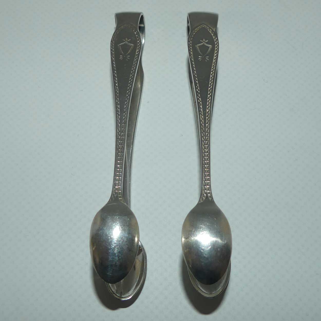 Matched Pair of Walker Hall & Sons silver plated sugar tongs
