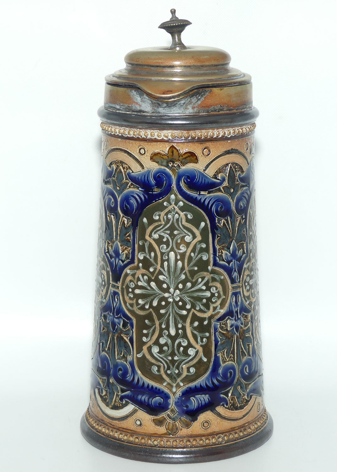 Doulton Lambeth stoneware lidded ale jug with pate-sur-pate cartouches and incised scrollwork  (Parker)