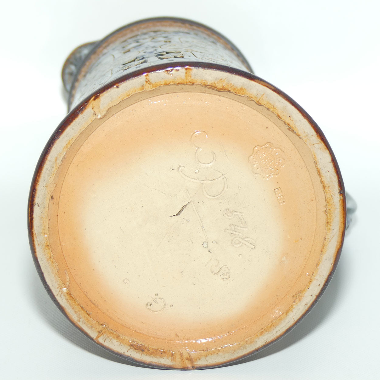 Doulton Lambeth stoneware lidded ale jug with pate-sur-pate cartouches and incised scrollwork  (Parker)