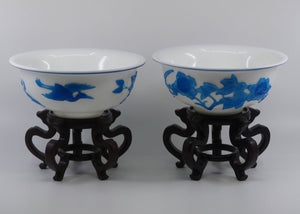 pair-of-peking-glass-bowls-on-wooden-stands-blue-over-milk-glass-qing-dynasty