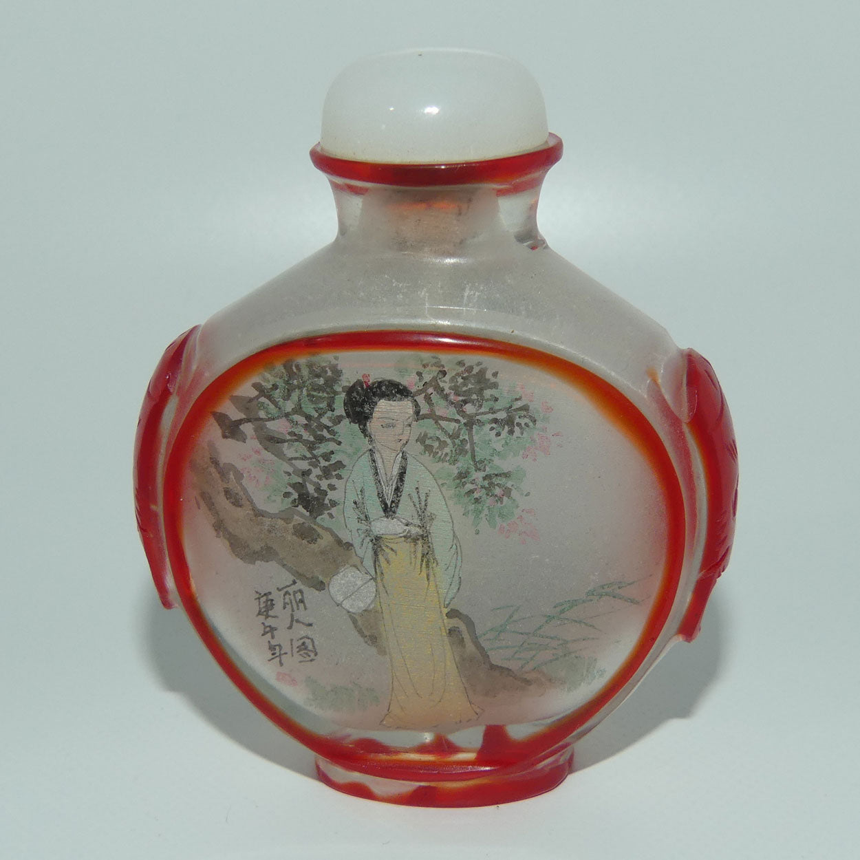 Peking Glass Red and Clear Reverse Painted double scene Snuff Bottle