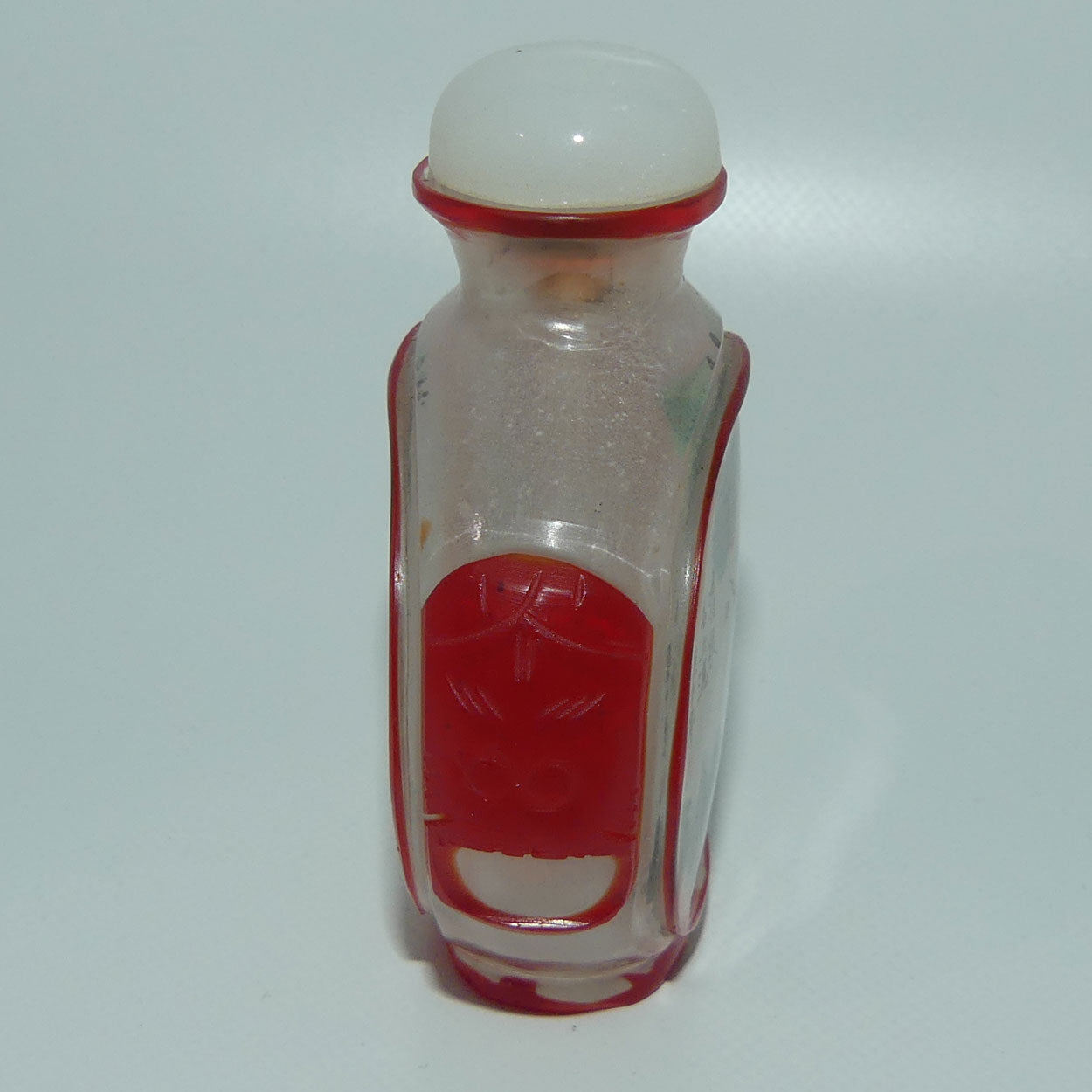 Peking Glass Red and Clear Reverse Painted double scene Snuff Bottle
