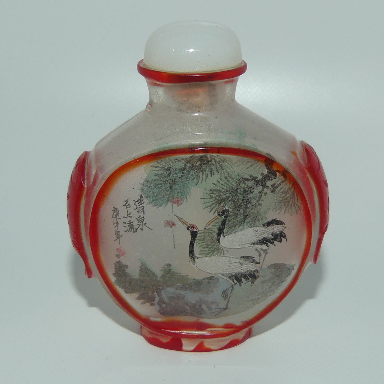 Peking Glass Red and Clear Reverse Painted double scene Snuff Bottle