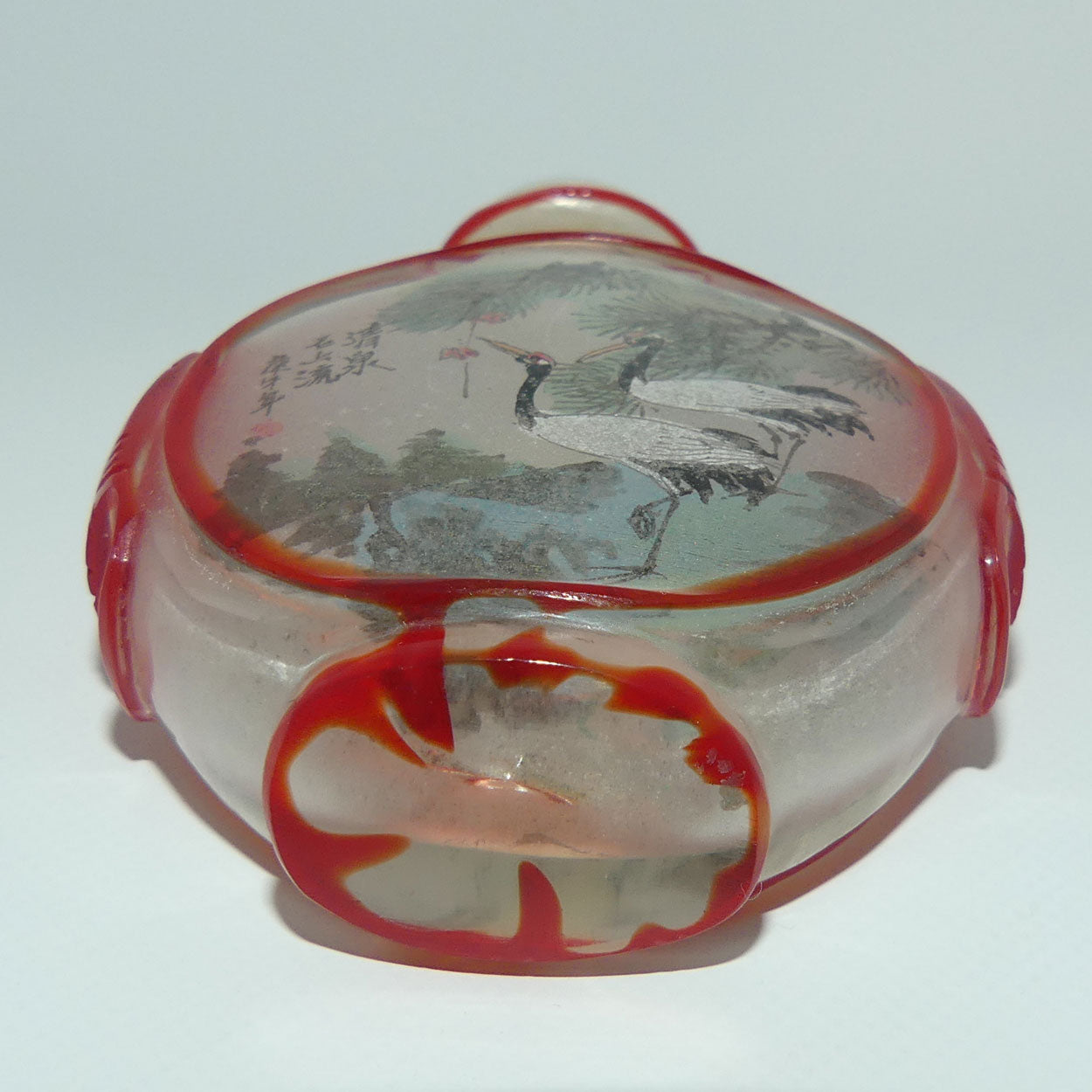 Peking Glass Red and Clear Reverse Painted double scene Snuff Bottle