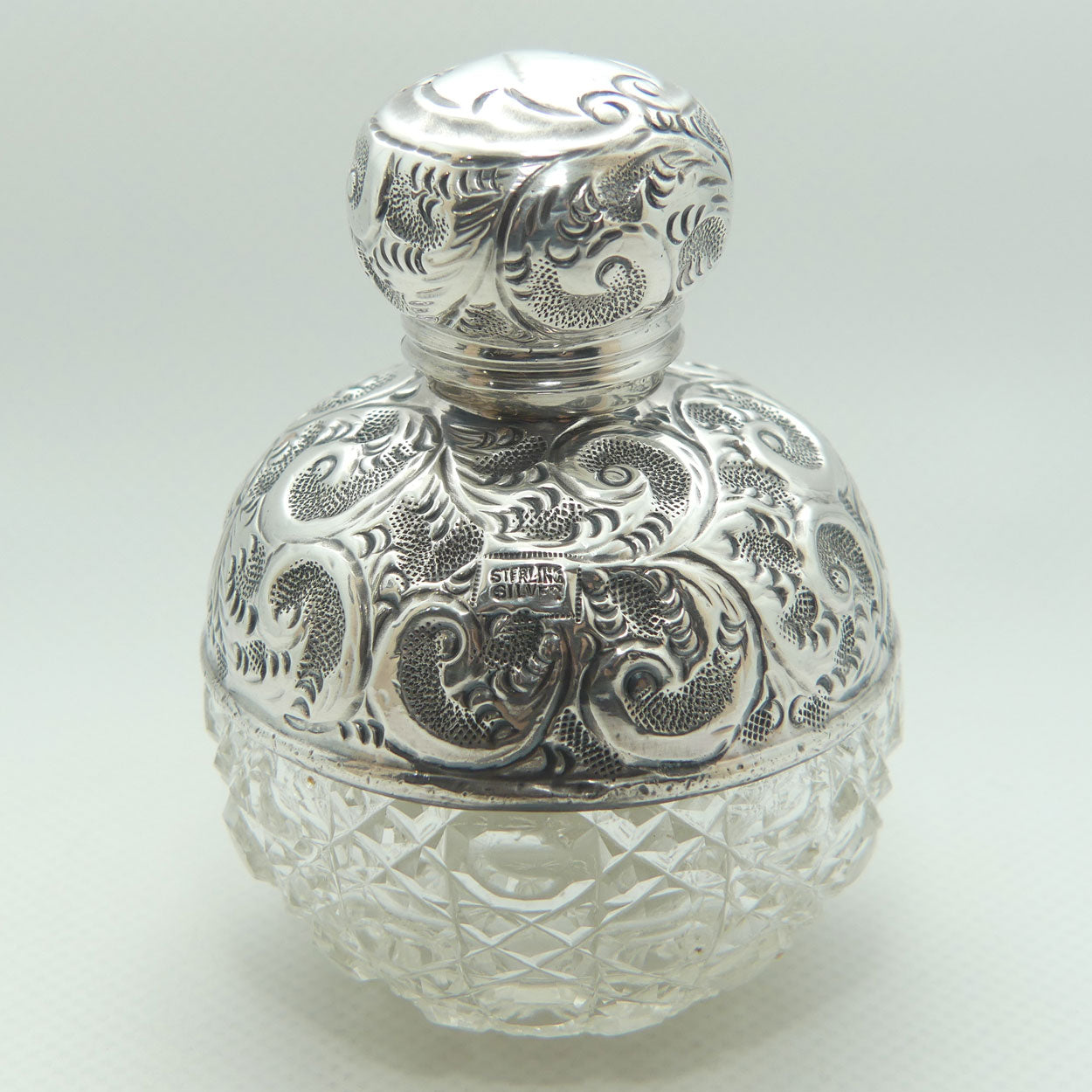 Sterling Silver and Cut Crystal perfume or cologne bottle | London 1911