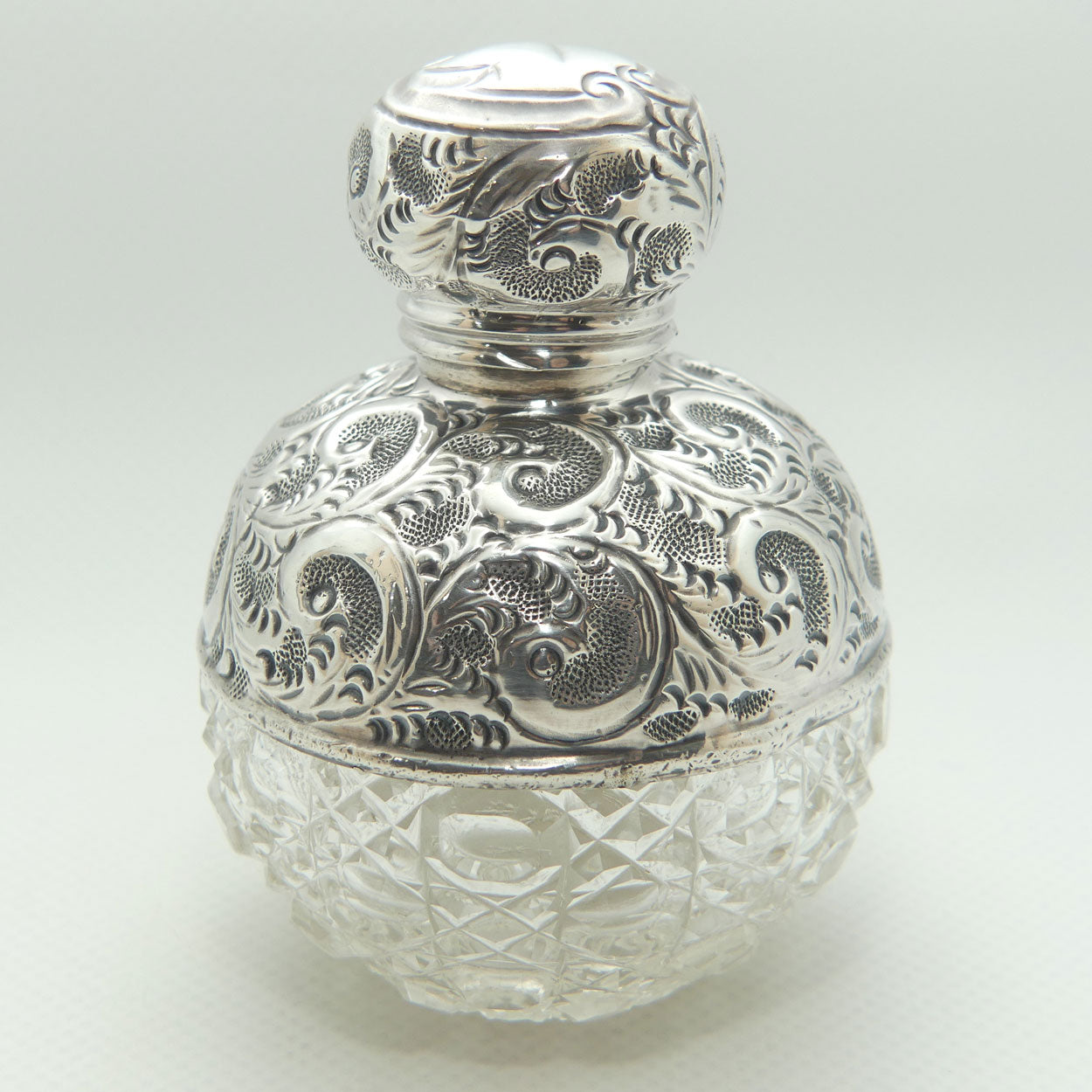 Sterling Silver and Cut Crystal perfume or cologne bottle | London 1911