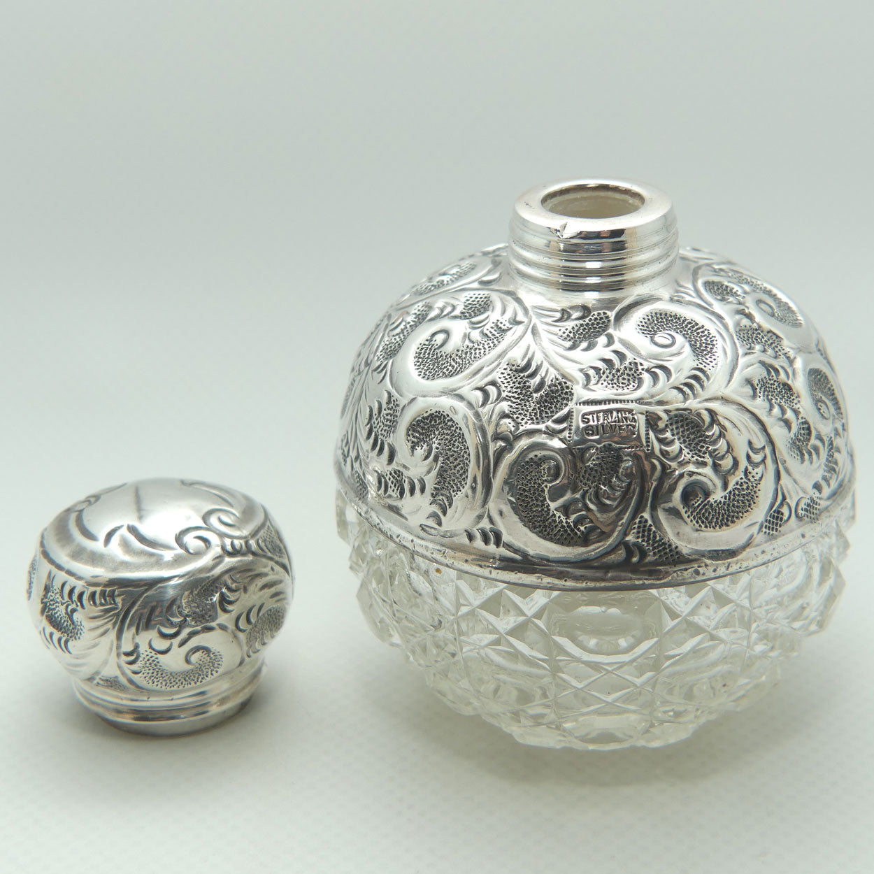 Sterling Silver and Cut Crystal perfume or cologne bottle | London 1911