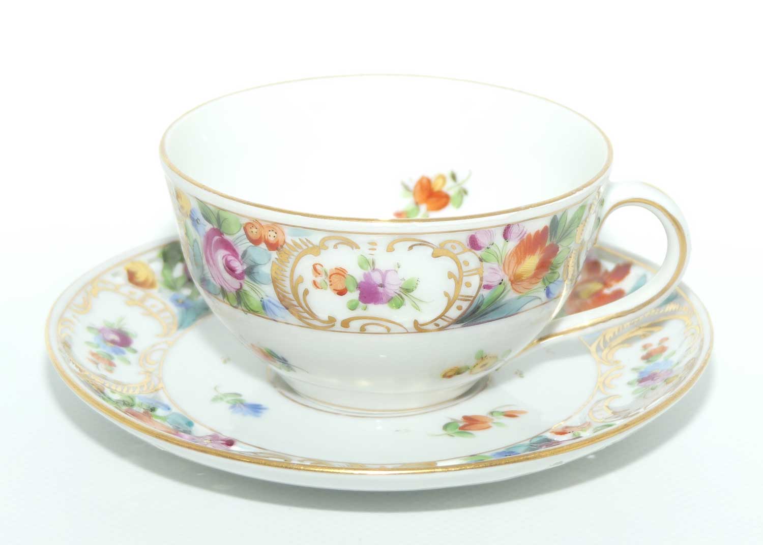 Exquisite pierced gallery Dresden floral cup and saucer