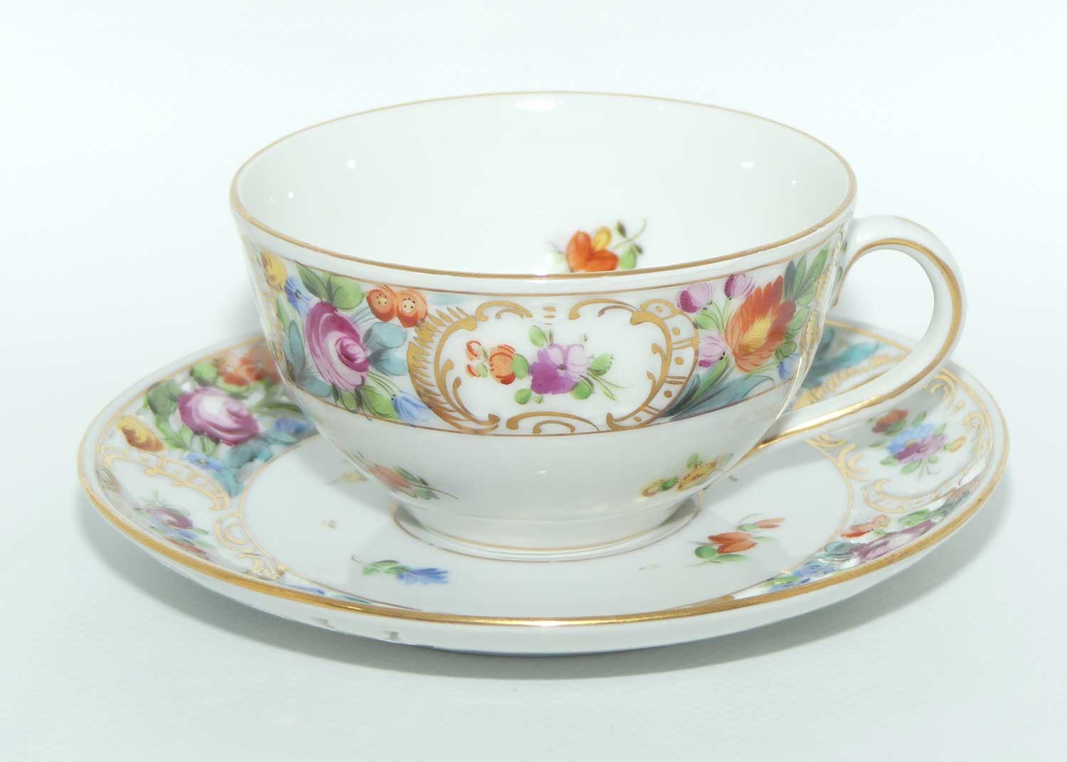 Exquisite pierced gallery Dresden floral cup and saucer