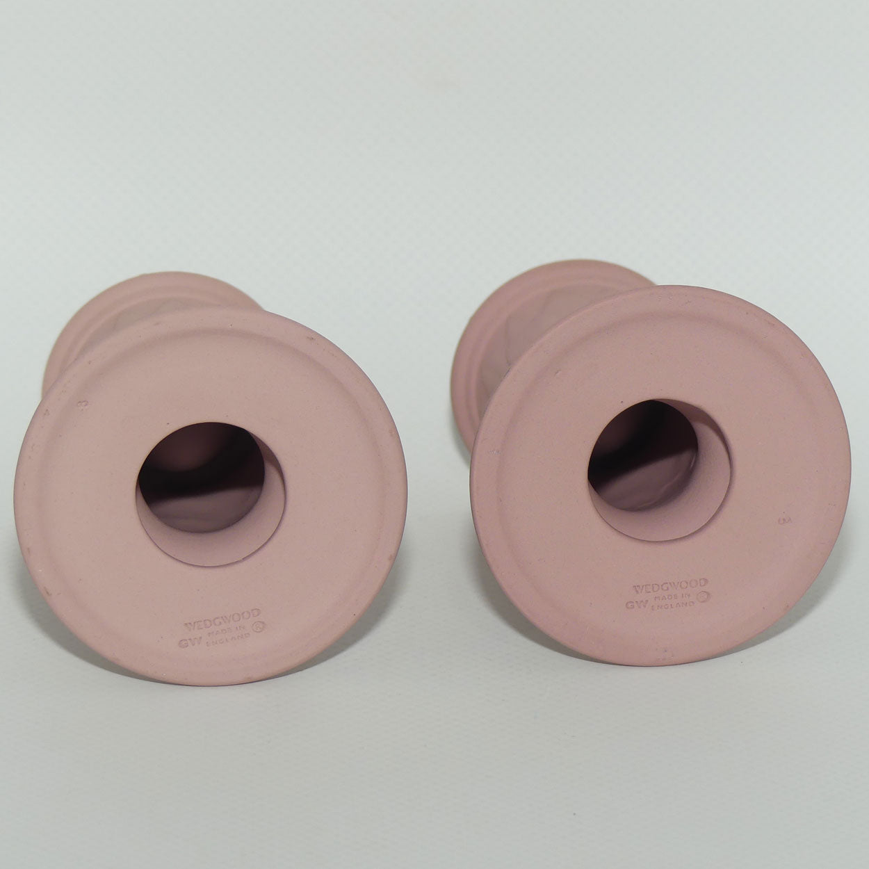 Wedgwood Jasper pair of candlesticks | White on Pink