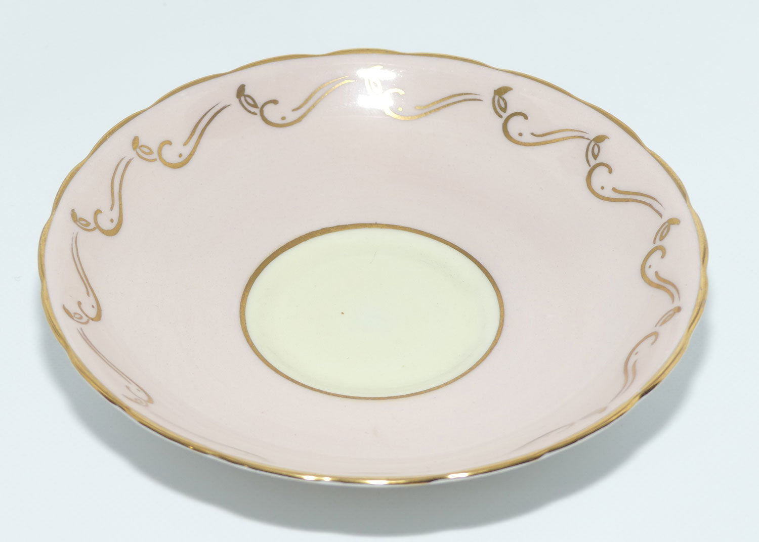 Tuscan Fine English Bone China Pink and Gilt Swirl trio | Fancy handle | Yellow Interior