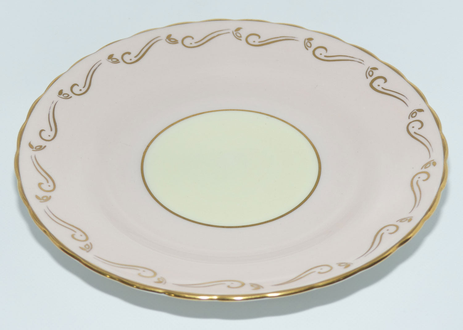 Tuscan Fine English Bone China Pink and Gilt Swirl trio | Fancy handle | Yellow Interior