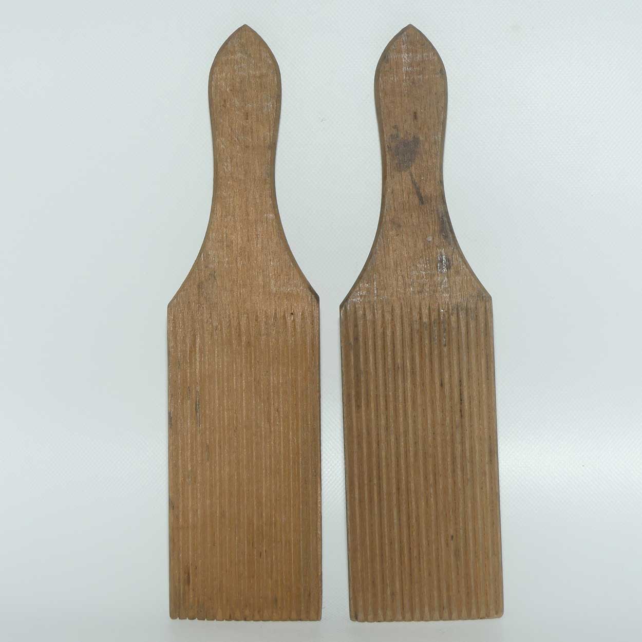 Pair of Australiana Pokerwork decorated butter pats