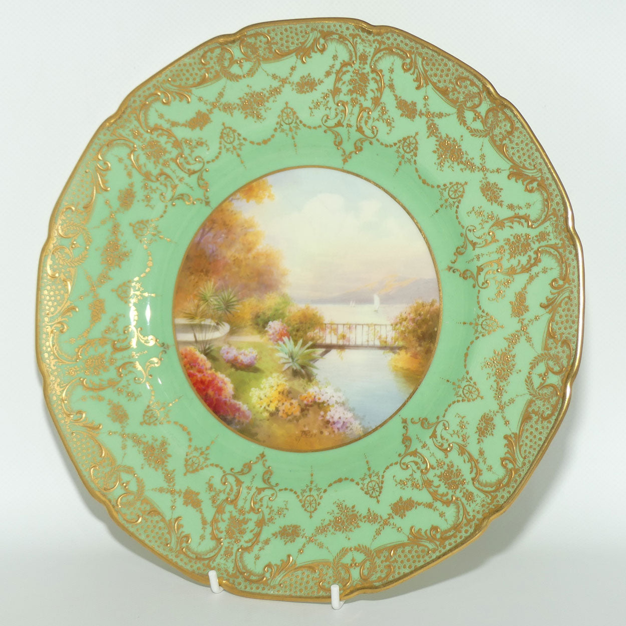 Royal Doulton hand painted and gilt Lake, Bridge & Garden plate (Price)