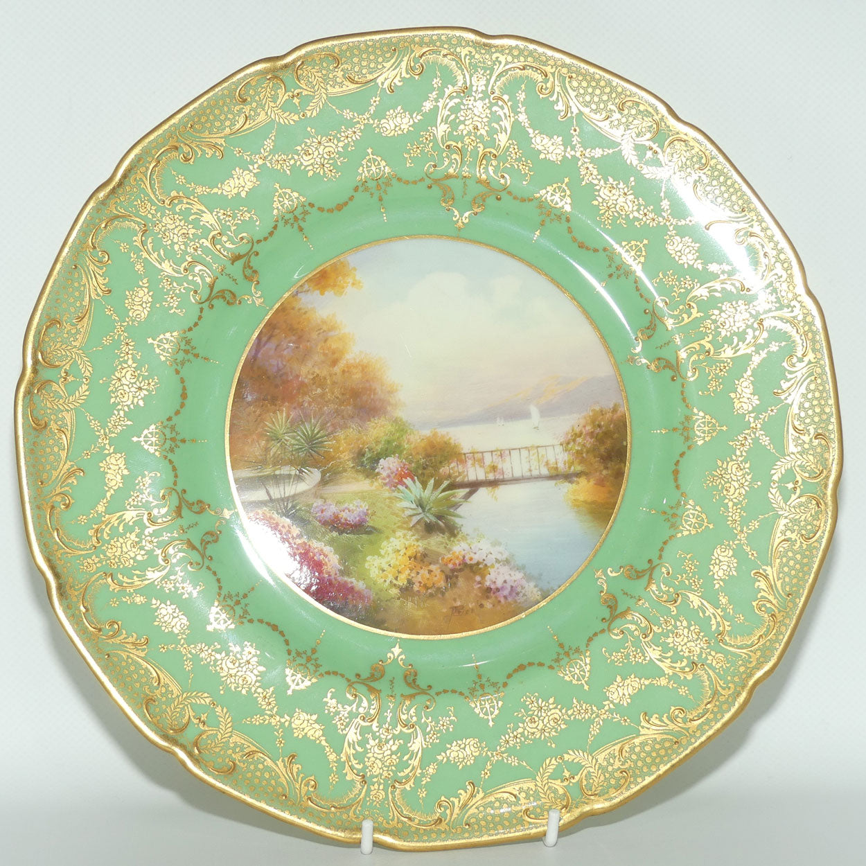 Royal Doulton hand painted and gilt Lake, Bridge & Garden plate (Price)