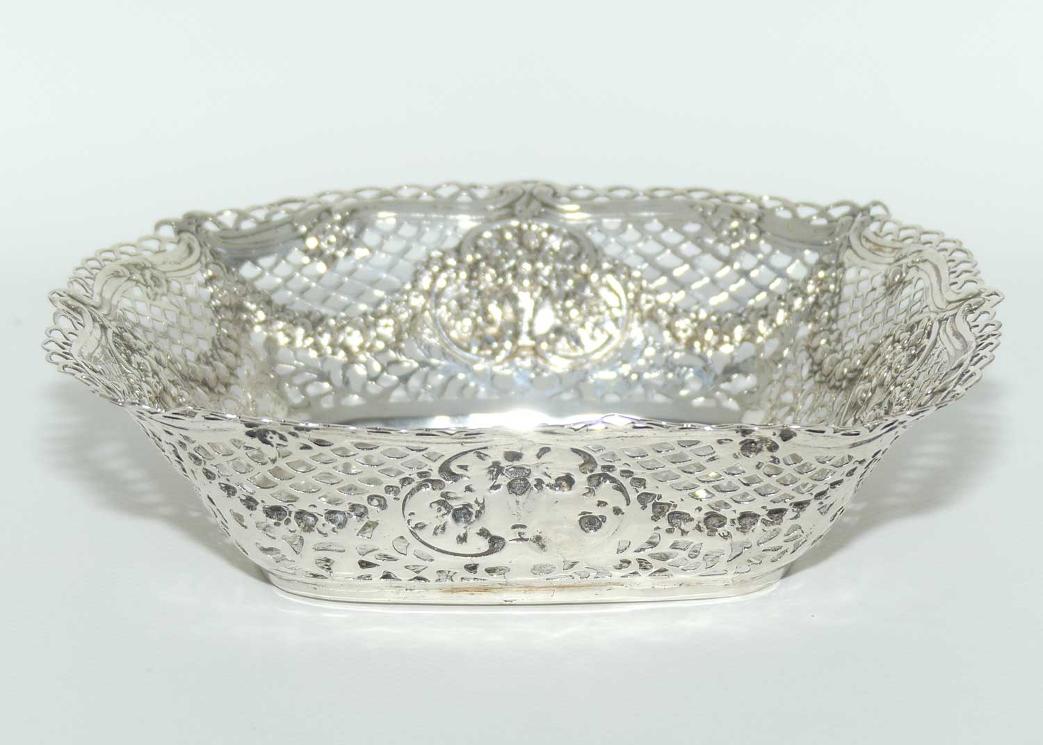 German 800 Silver  beautiful reticulated dish depicting Putti at Play